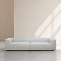 Canapé Quatre Places en Tissu Bouclette Beige - Confort et Élégance