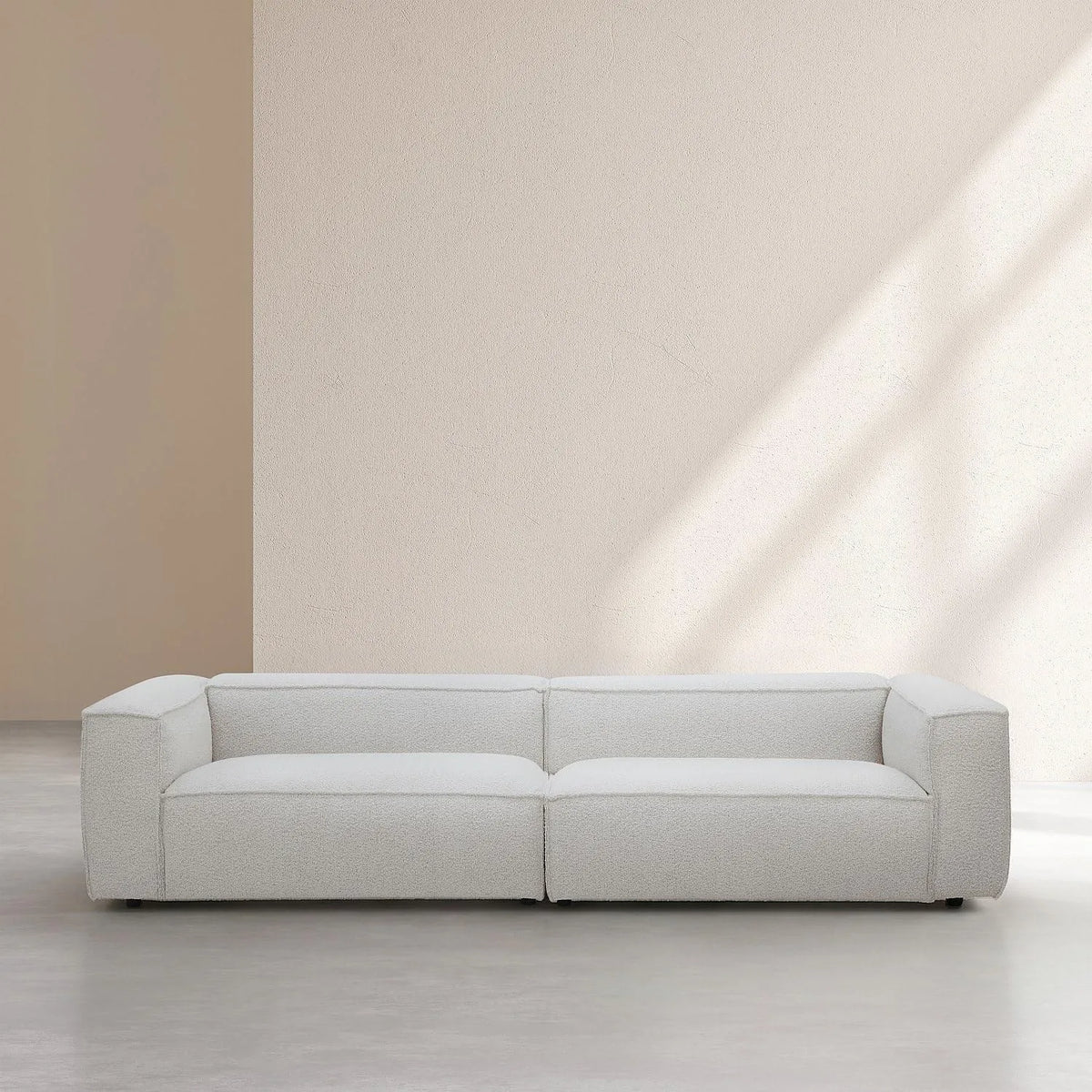 Canapé Quatre Places en Tissu Bouclette Beige - Confort et Élégance